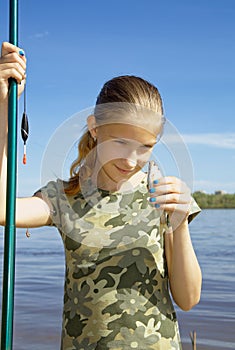 A teenage girl mocking her catch