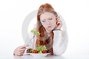 Teenage girl with no appetite photo