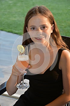 Teenage girl with non alcoholic cocktail