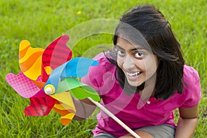 Teenage girl with pinwheel