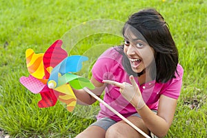 Teenage girl with pinwheel