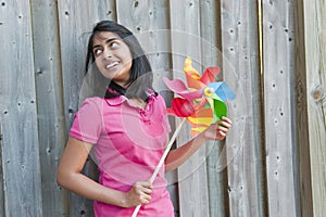 Teenage girl with pinwheel