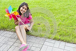 Teenage girl with pinwheel