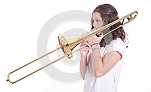 Teenage girl playing the trombone