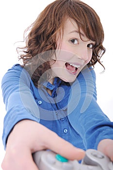 Teenage girl playing videogame