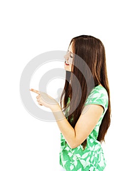 Teenage girl pointing at a blank board