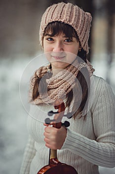 Teenage girl portrait with violin