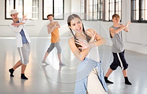 Teenage girl practicing active dance at studio