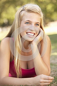 Teenage Girl Relaxing In Park