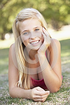 Teenage Girl Relaxing In Park