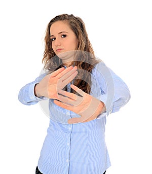 Teenage girl with repelling gesture