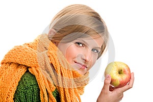 Teenage girl with ripe apple