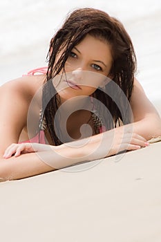 Teenage girl on sand at beach