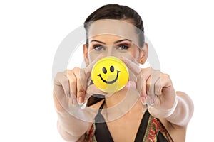 Teenage girl showing smile ball