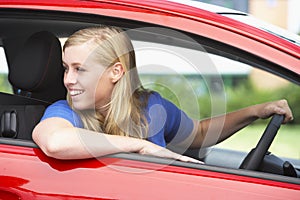 Teenage Girl Sitting In Car