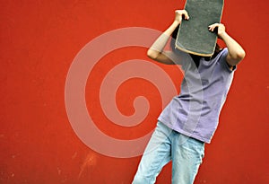 Teenage girl with skateboard