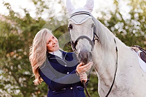 Teenage girl smacks horse in snout