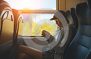 Teenage girl with smartphone travelling