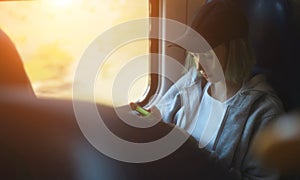 Teenage girl with smartphone travelling