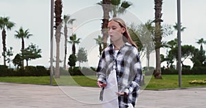 Teenage girl spending leisure time in park