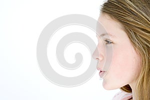 Teenage girl standing with mouth open