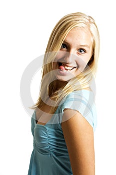 Teenage girl sticking out tongue