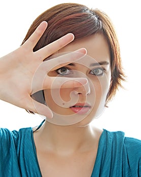 Teenage girl with stop gesture