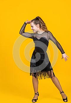 teenage girl straight ballroom dancer wear black dress in dance pose, dance