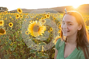 Teenage girl in sunflower field