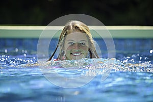 Teenage girl swimming