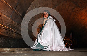 A teenage girl in the Templars tunnel in Akko, Israel