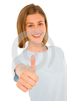 Teenage girl with thumb up