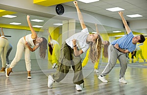 Teenage girl training breakdance Toprock moves in dance hall