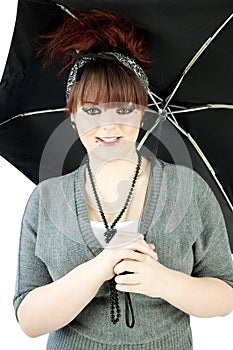 Teenage girl with umbrella