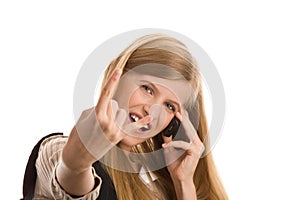 Teenage girl using cell phone gesturing