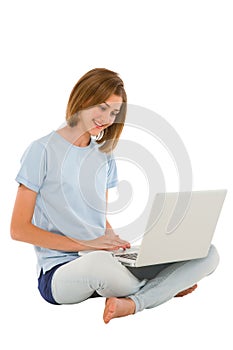 Teenage girl using laptop