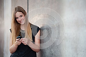 Teenage girl using smart phone