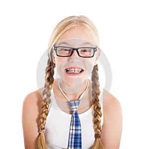 Teenage girl wearing a school uniform and glasses. Smiling face, braces on your teeth.