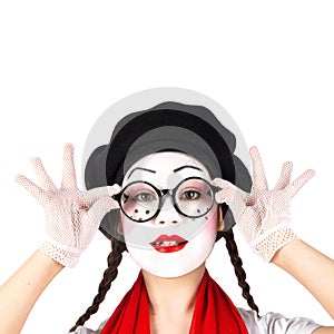Teenage girls in the image of mimes with makeup on their faces, isolate on a white background