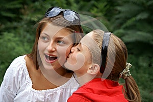 Teenage girls playing outdoors