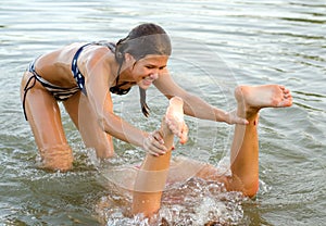 Teenage girls playing in the water