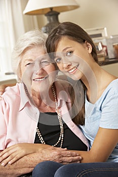 Teenage Granddaughter Visiting Grandmother At Home