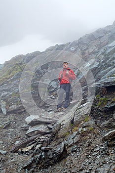 Teenage hiker on mountain