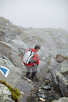 Teenage hiker on mountain