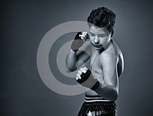 Teenage kickboxer training