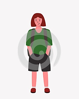 Teenage school girl wearing green shirt and black shorts.