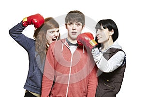 Teenage siblings fighting with boxing gloves