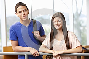 Teenage student girl and boy indoors