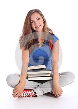 Teenage student girl with school study books
