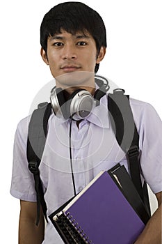 Teenage student holding books